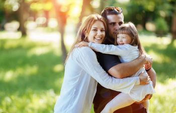 Happy family with disabled daughter