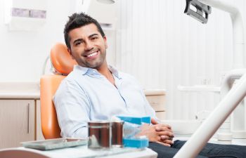 Happy dentist patient