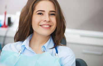 Happy dentist patient