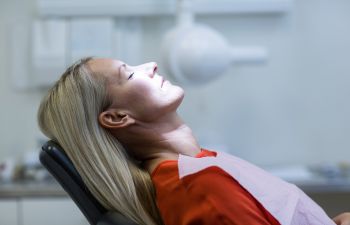 woman sleeping on the dentist chair