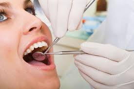 a woman undergoing a dental checkup