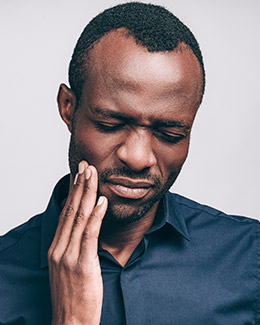 a black man with toothache