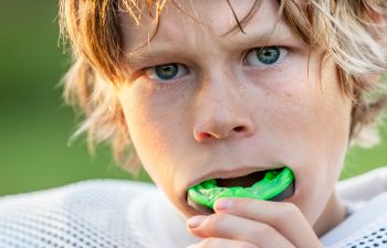 Boy with a mouthguard