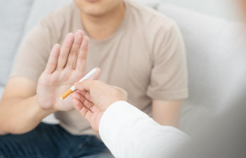 man refuse cigarette